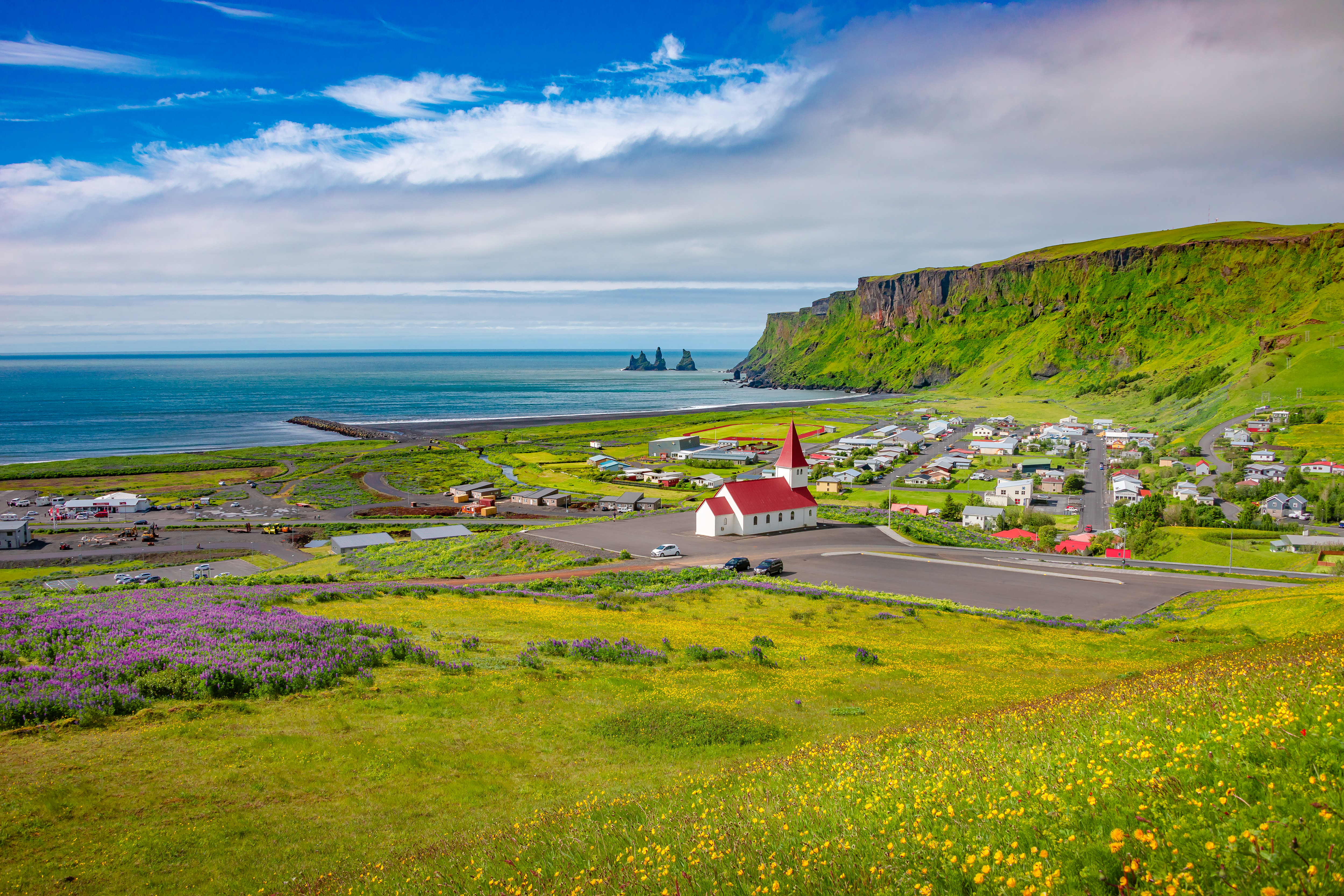 Panoramic view of Vik, South Iceland, on a summer sunny day with blue skies