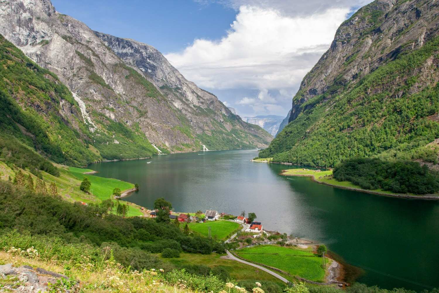 Traditional houses on a hill, overlooking dramatic fjords in Rakssetra, Norway