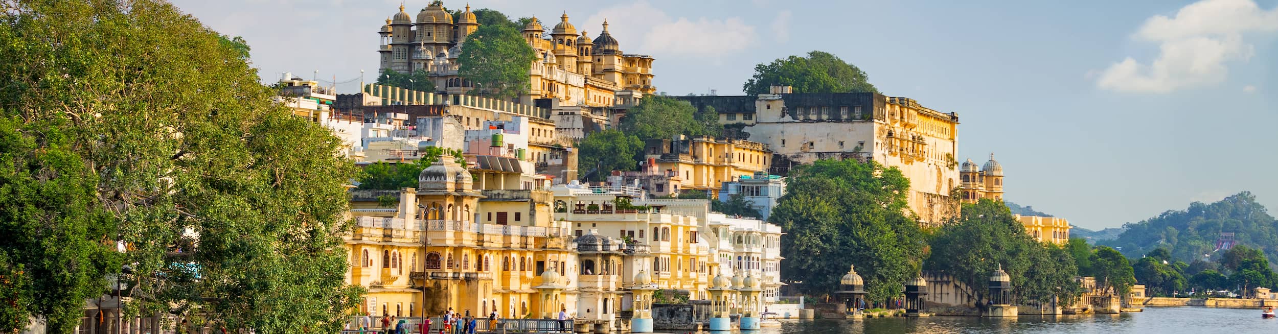 River backed by City Palace in Udaipur, India