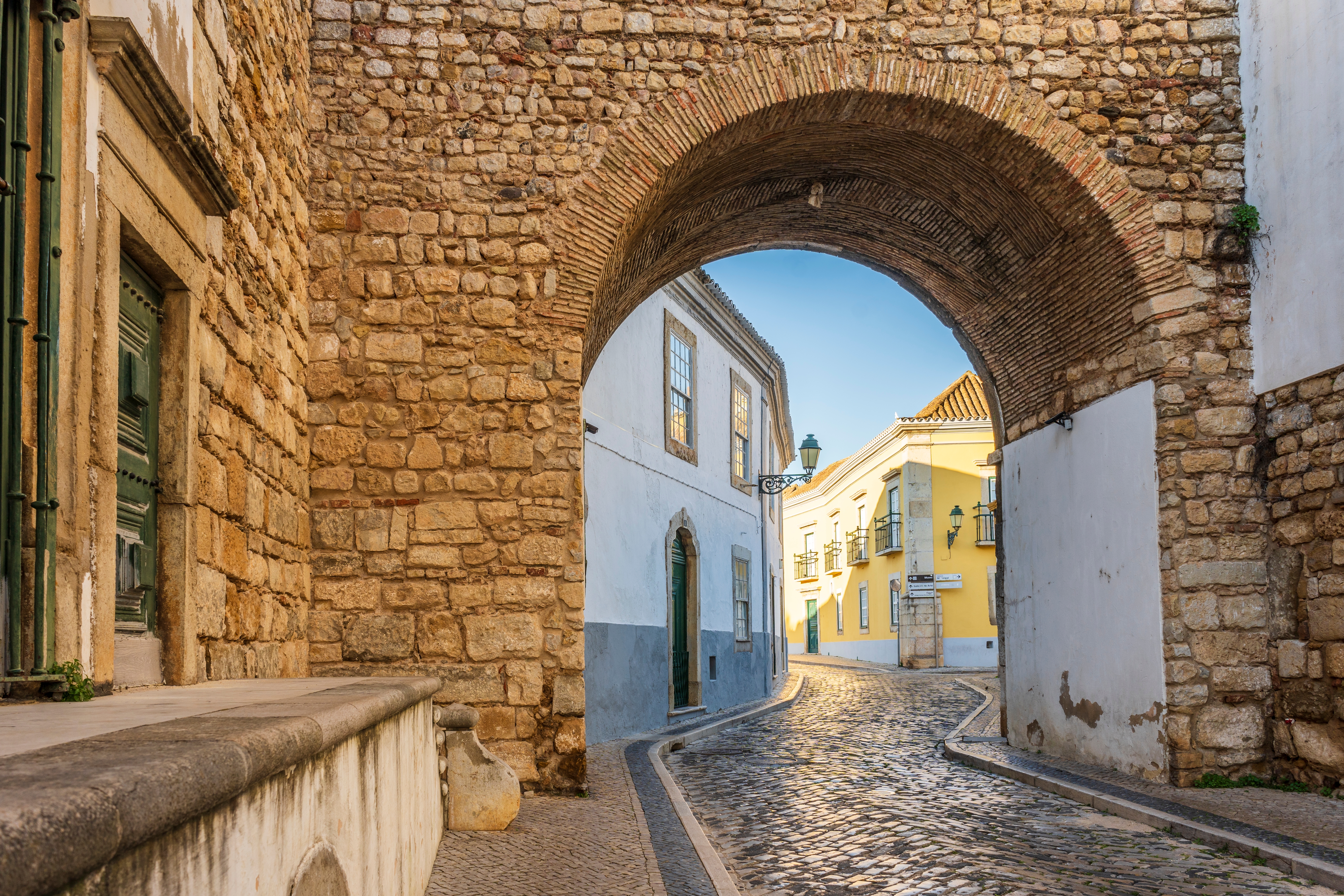 Medieval arch in Faro Old Town, Algarve, Portugal