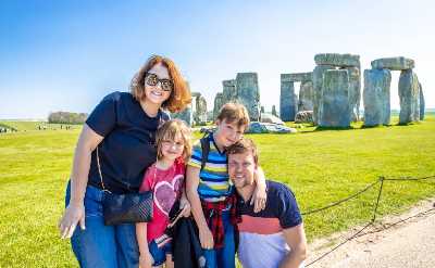 Family at Stonehenge in summer