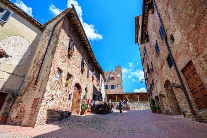 Tuscan Day Trip: Medieval Villages, Cooking Class & Wine Tasting